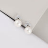 Three Small Round Cubic Zircons Top With Pearl Below