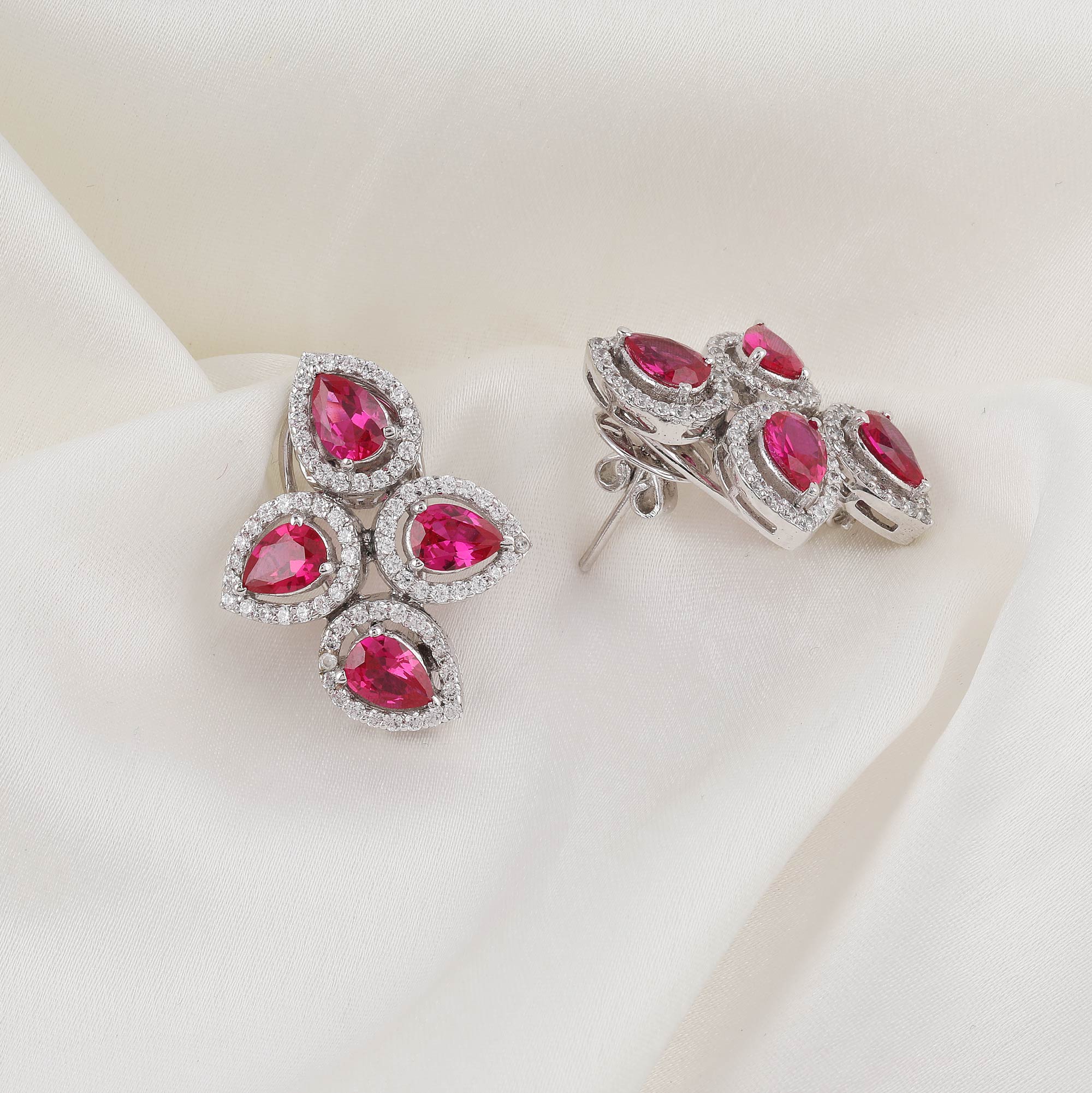 Ruby Studs With Round Solitaire Borders