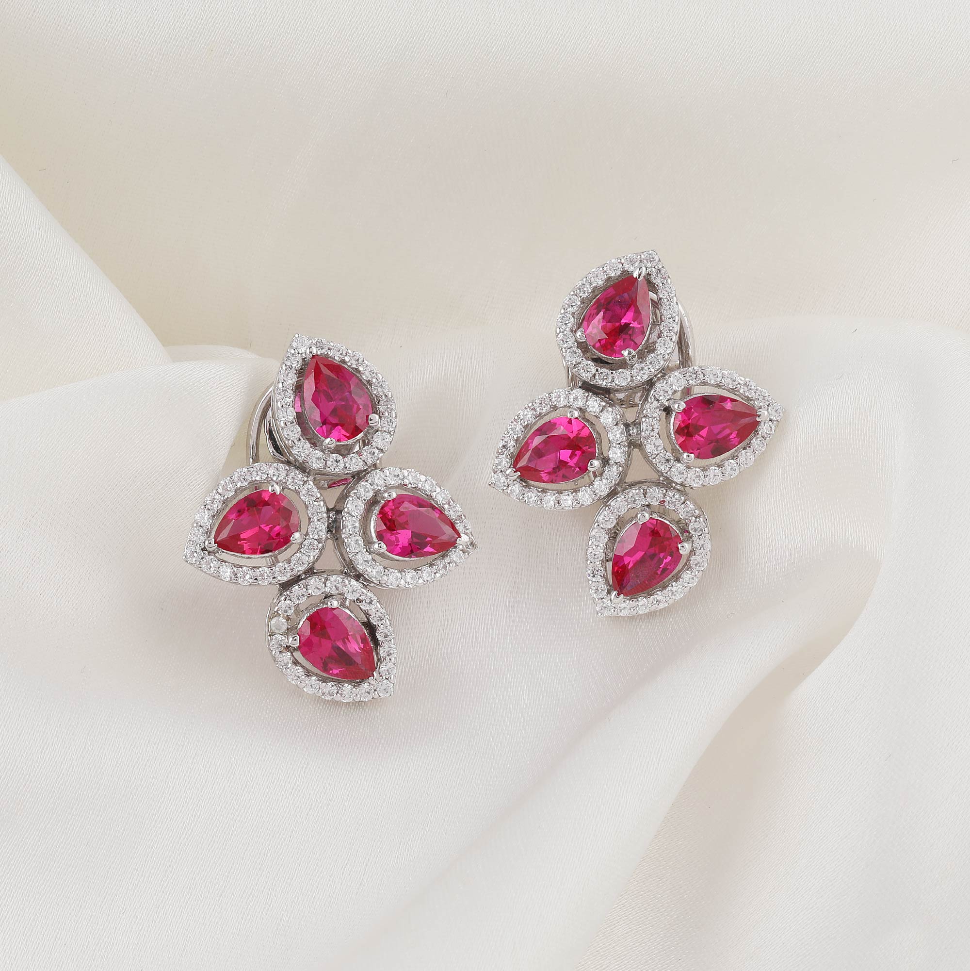 Ruby Studs With Round Solitaire Borders